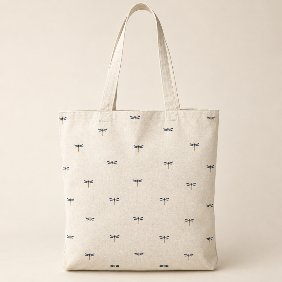 Ivory tote with tiny dragonflies dotted across the front